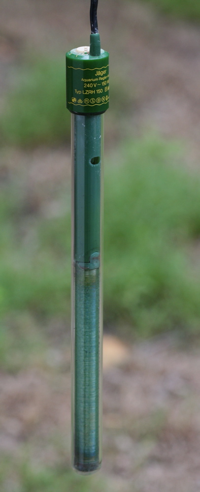 Submersible aquarium heater with adjustable thermostat for maintaining stable water temperature
